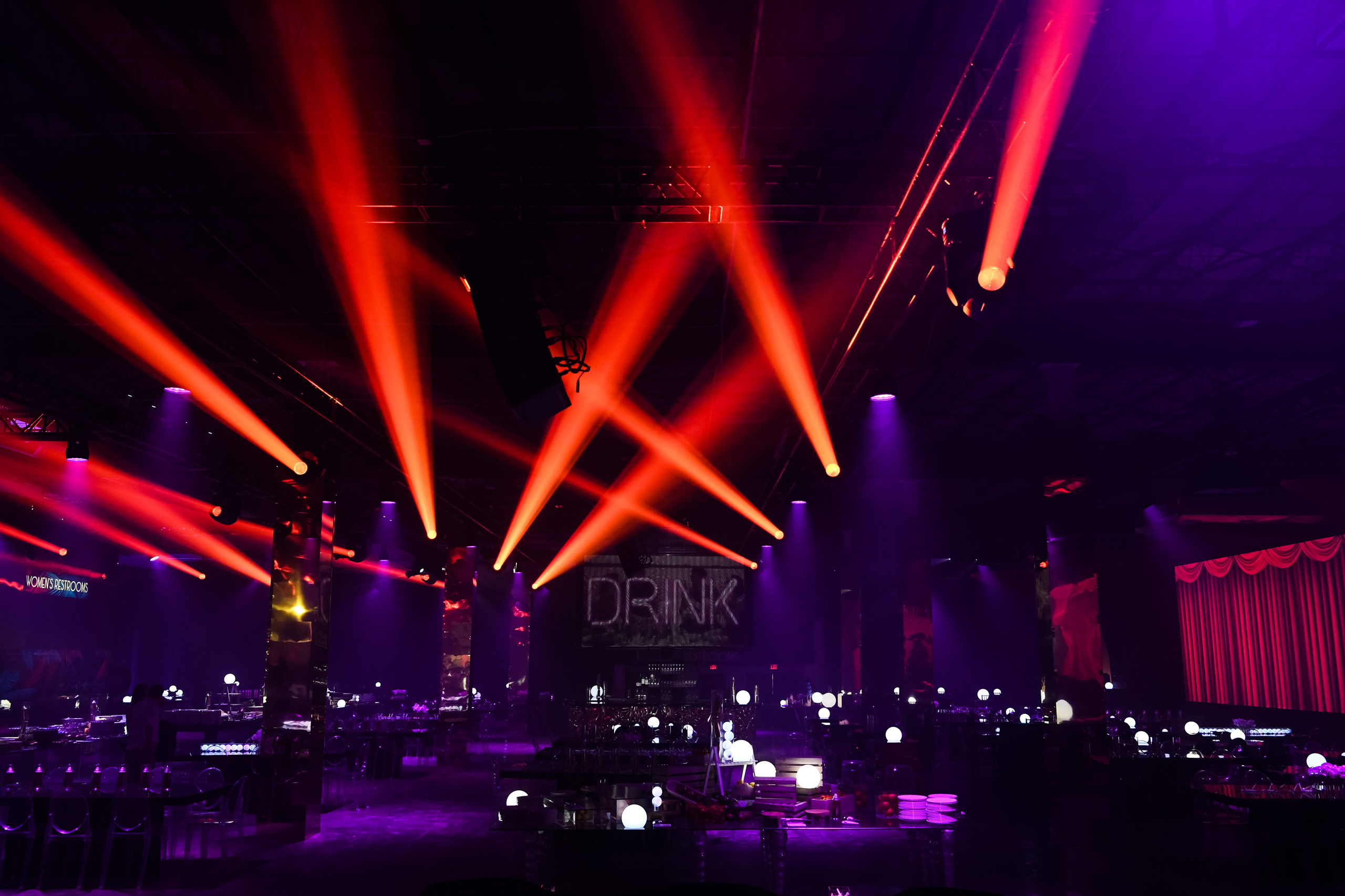 An elaborate setup with light beams for a company reception