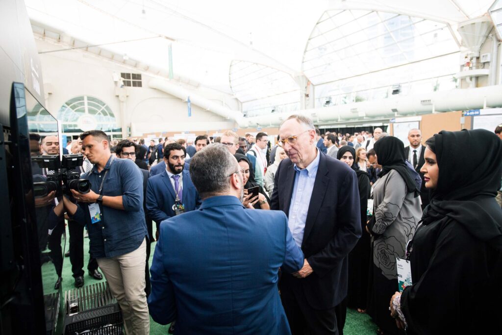 Jack Dangermond interacts with exhibitors at the ESRI conference in San Diego