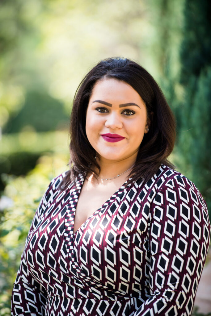 Woman wearing a printed dress for her professional headshot